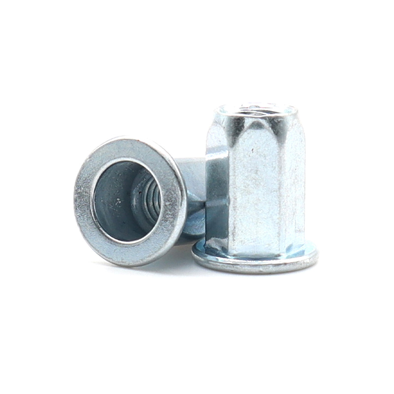 Заклепочная гайка с плоской головкой и полным шестигранником