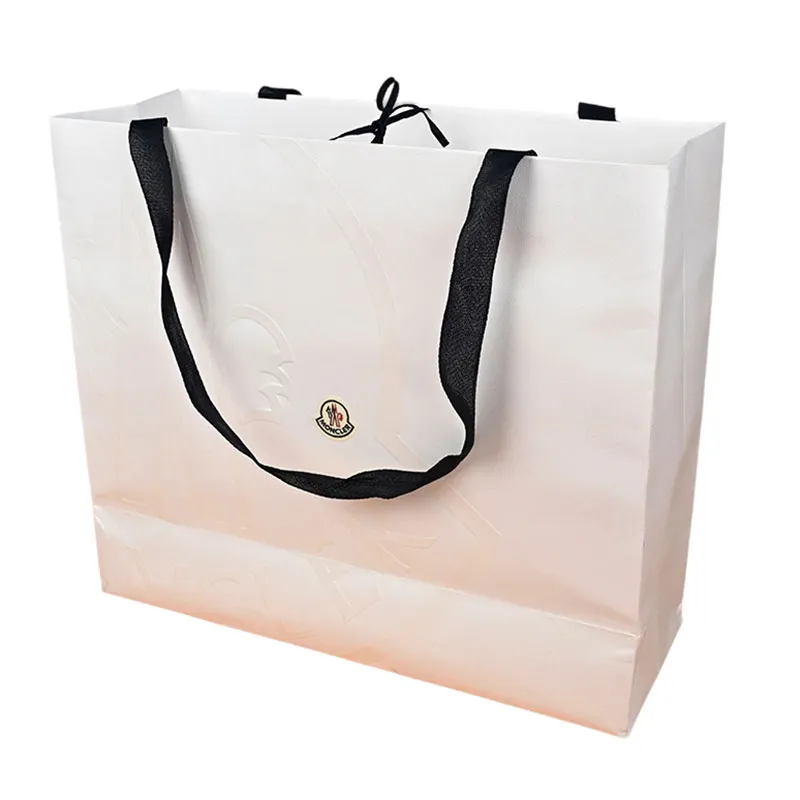 Решение по экологичным бумажным пакетам с вышивкой и тиснением