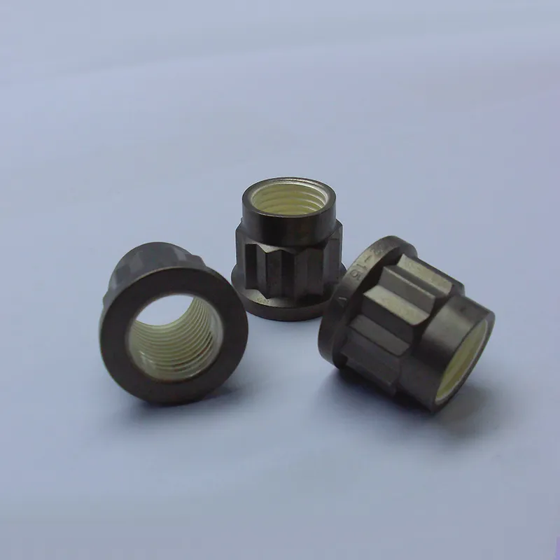 Самоконтрящиеся двенадцатигранные гайки с удлинённой бобышкой под ключ, с покрытием серебром и резьбой UNJF