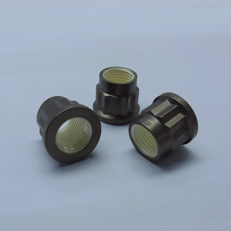 Самоконтрящиеся двенадцатигранные гайки с удлинённой бобышкой под ключ, с покрытием серебром и резьбой UNJF