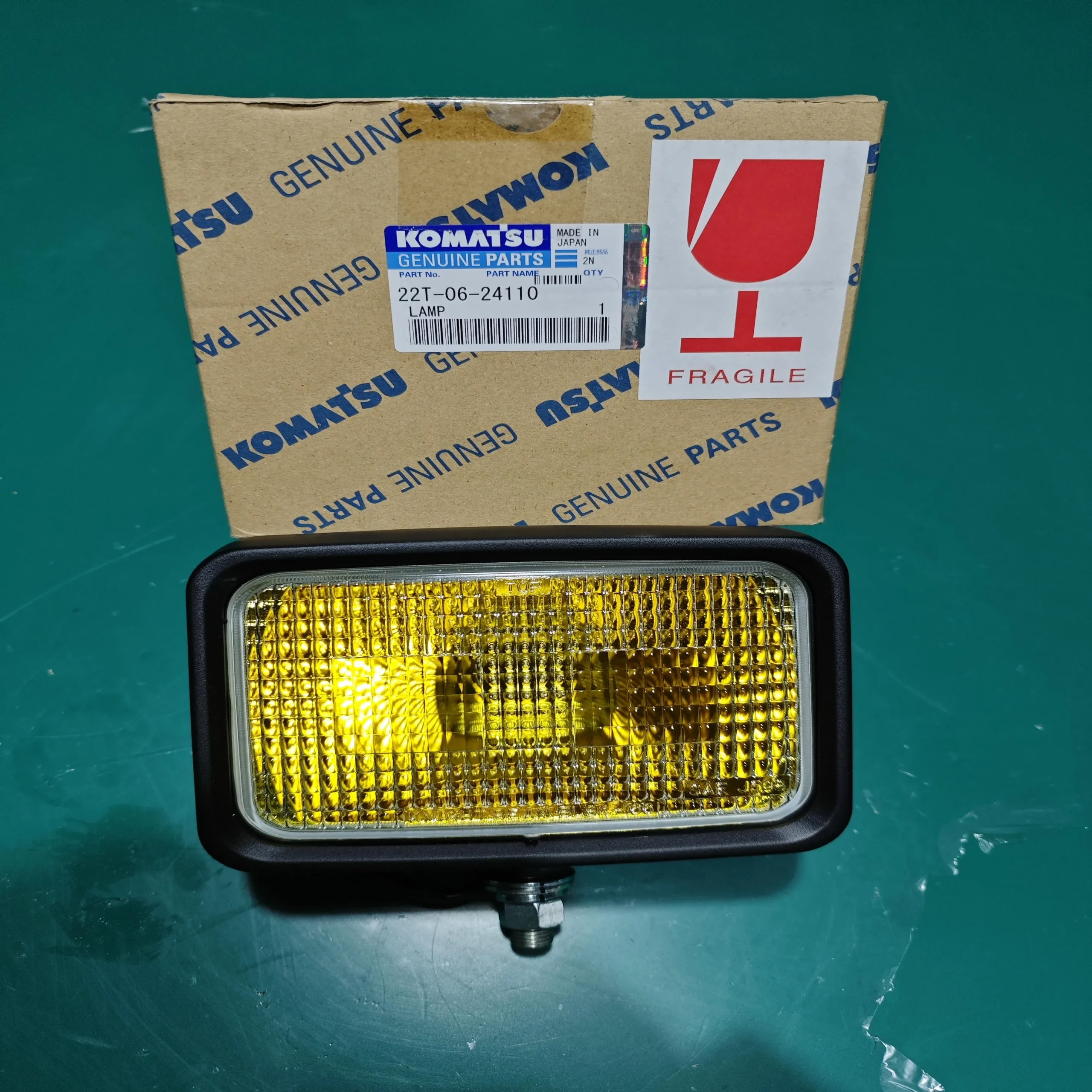 Оригинал Komatsu HD350 2 Лампочка фары 22T – 06 – 24110