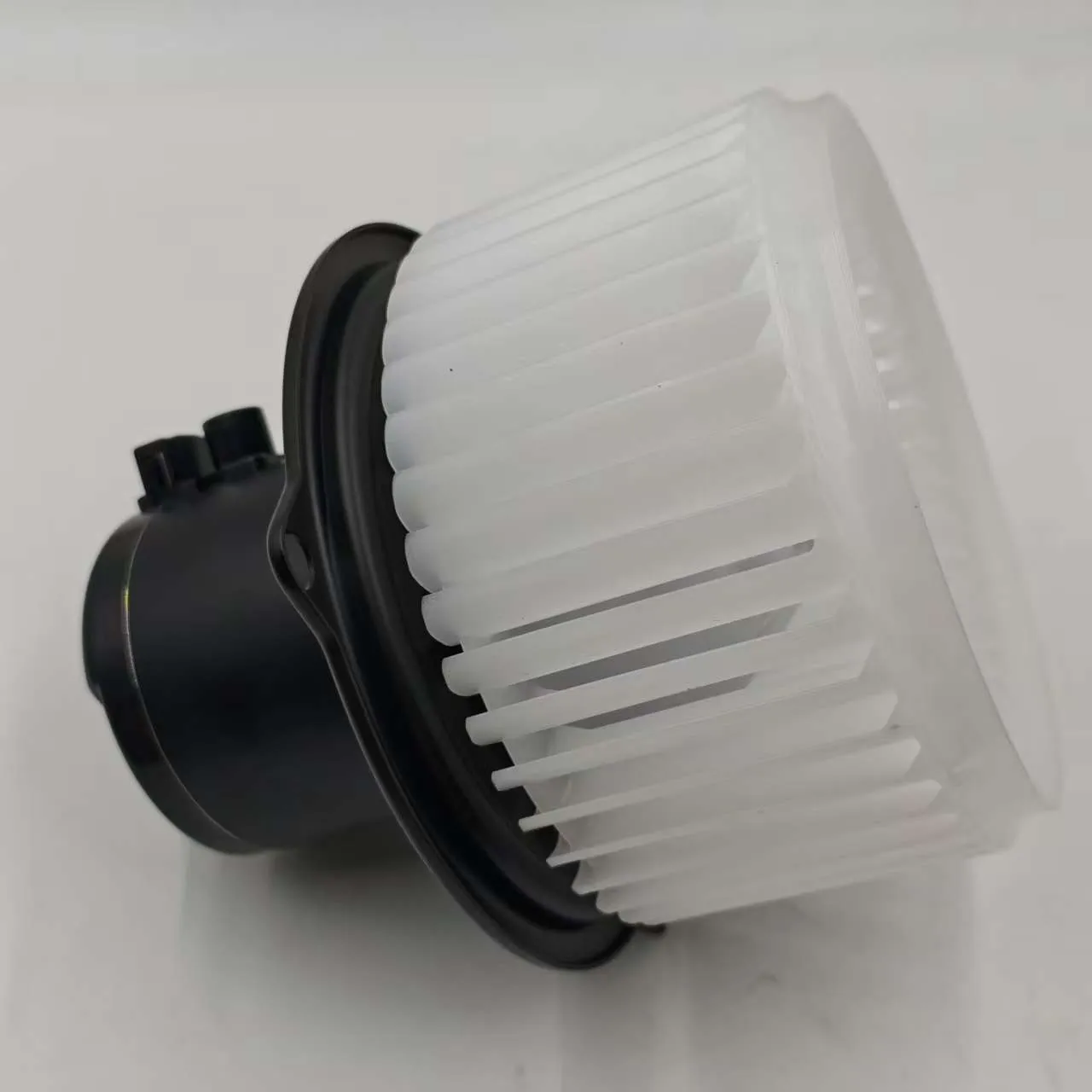 genuine Komatsu blower motor assembly, manufactured by Denso for Komatsu heavy equipment HVAC systems