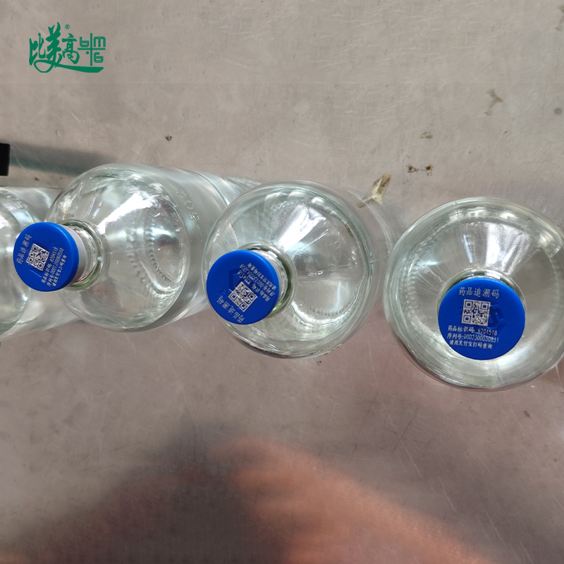 Поточная линия для лазерной маркировки QR-кода с разделением бутылок