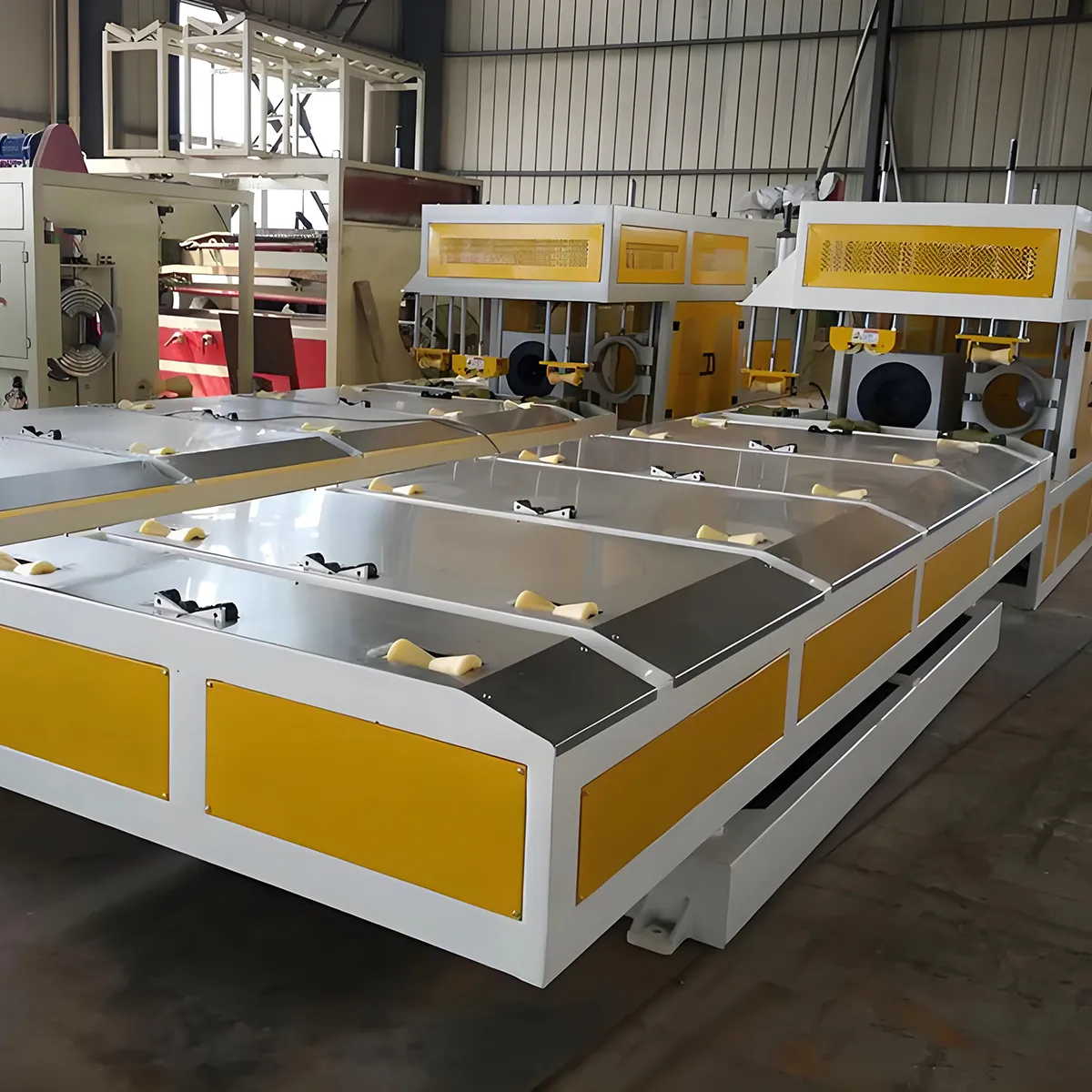 Экструзионные Линии для производства жесткой гладкостенной ПВХ трубы