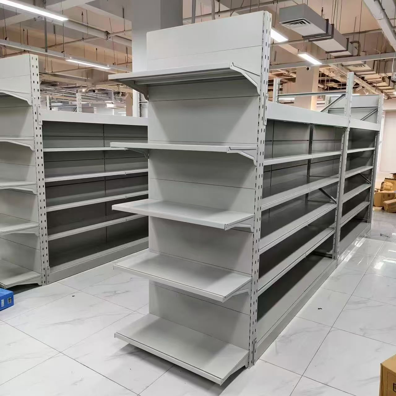 Компания Harbin Jiusheng Metal Structure: реализовала проект по изготовлению стеллажей для супермаркета по индивидуальному заказу, обеспечив эффективную работу торговых точек.