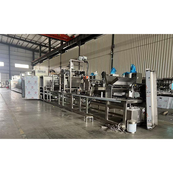 Наша новая линия по производству жевательных конфет, ориентированная на экспорт, близится к завершению.