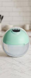 Разобранный бюджетный молокоотсос с силиконовой мембраной и тефлоновым клапаном