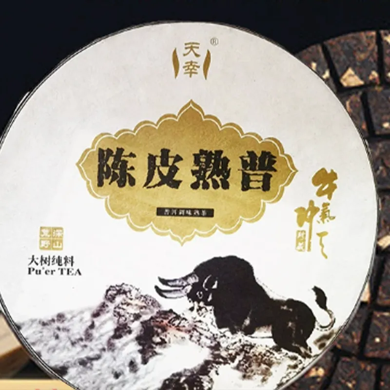 Прессованный блин выдержанного пуэра с кожурой мандарина 2018 года 357 г