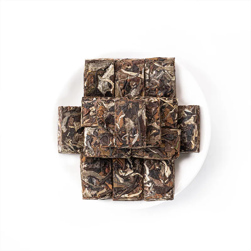 Юньнаньский белый чай прессованный пластинчатый по 8 г в бумажной упаковке 500 г