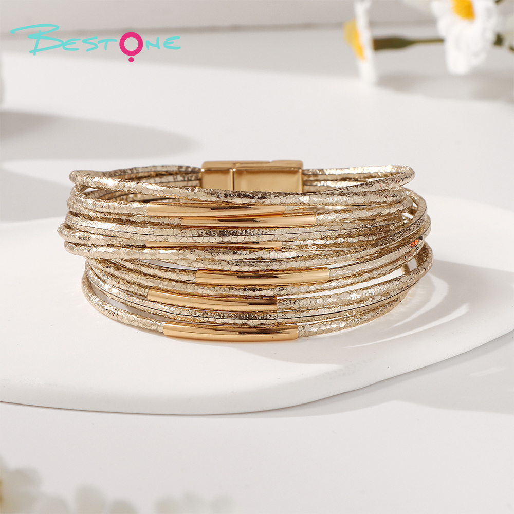 Женский многослойный браслет с металлическими элементами и магнитной застёжкой