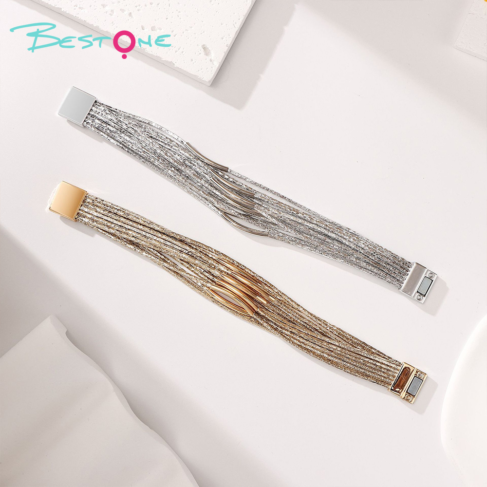 Женский многослойный браслет с металлическими элементами и магнитной застёжкой