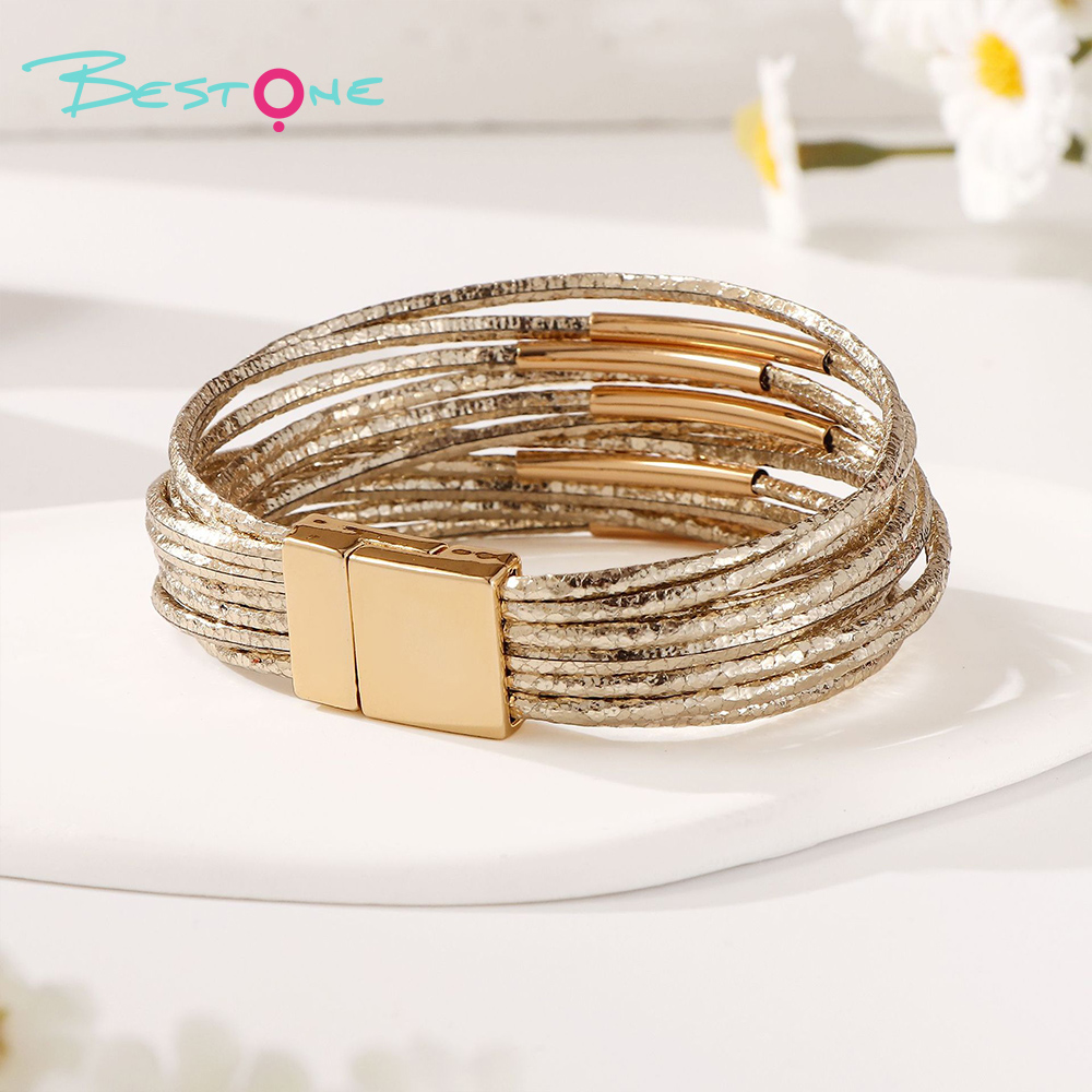 Женский многослойный браслет с металлическими элементами и магнитной застёжкой