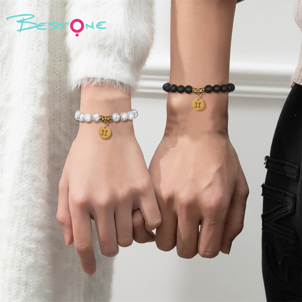 Браслет со знаком зодиака из матового чёрного стекла и белой сосны 8 мм, на эластичной нити