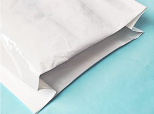 Деталь комбинированного тканого мешка: структура тканого слоя и внутреннего покрытия